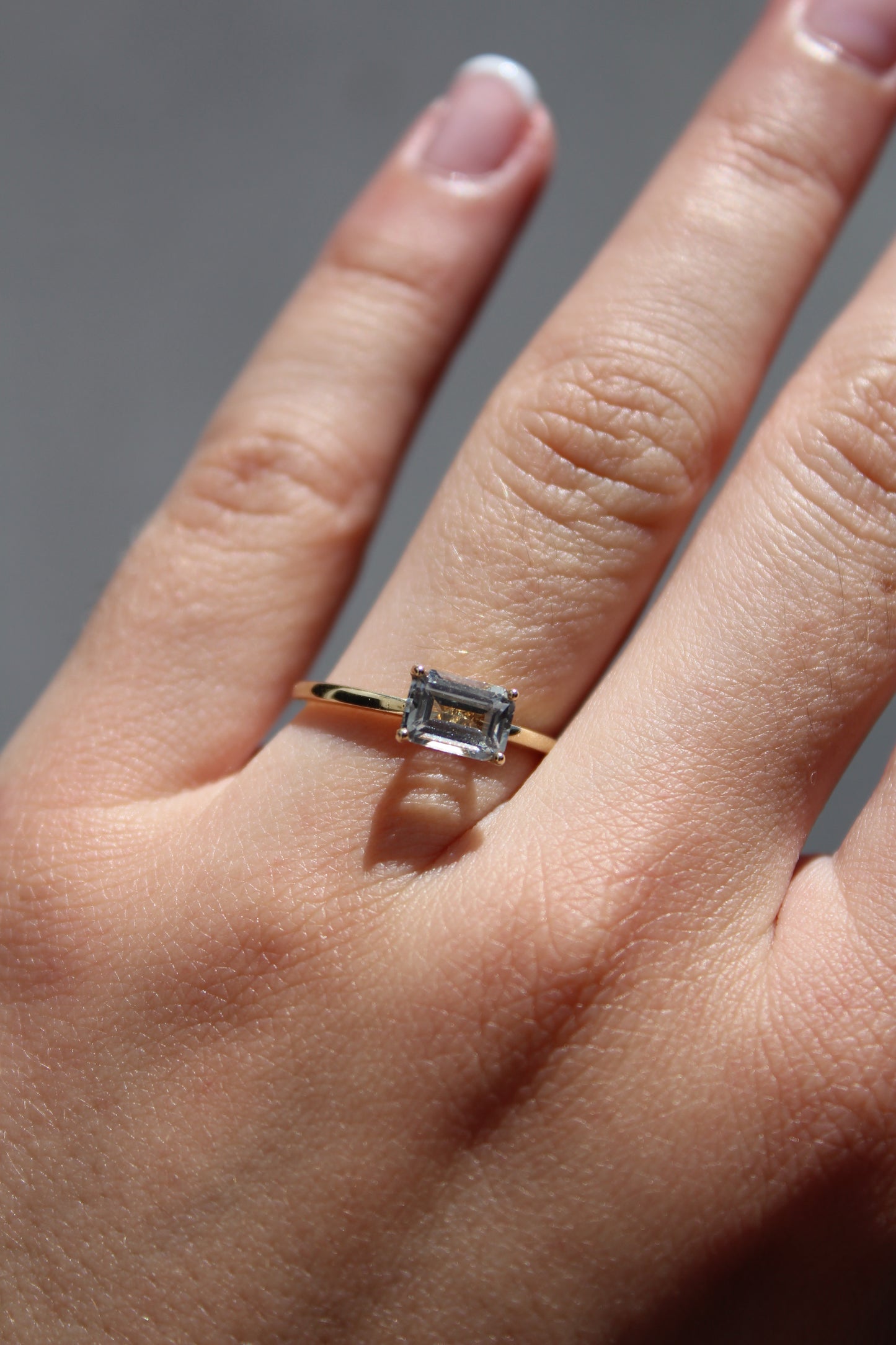 HORIZONTAL EMERALD CUT DIAMOND RING