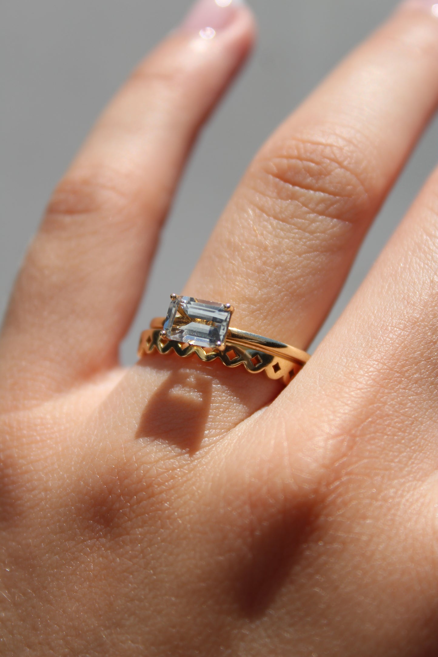 HORIZONTAL EMERALD CUT DIAMOND RING