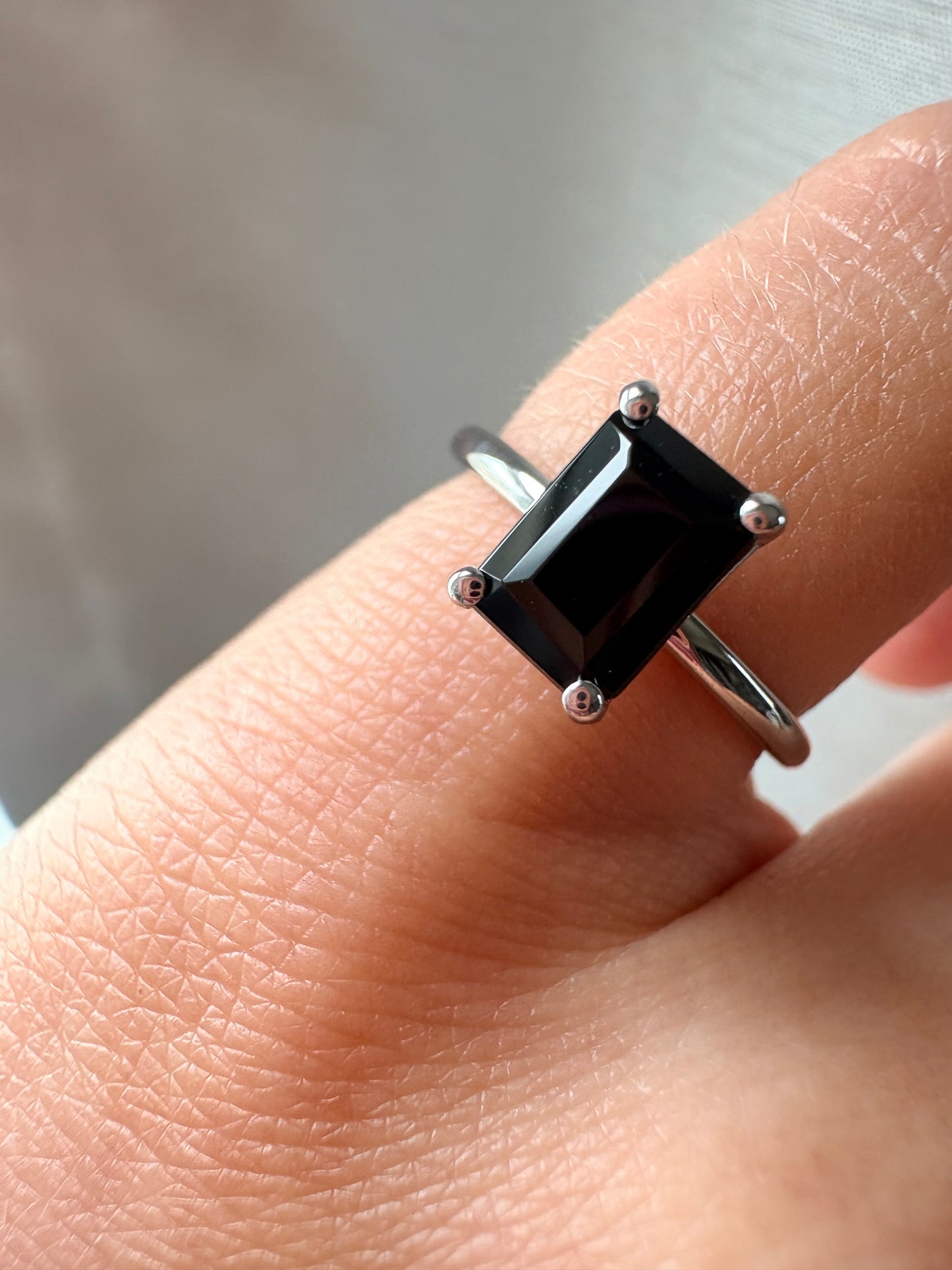 ONYX EMERALD CUT SOLITAIRE RING