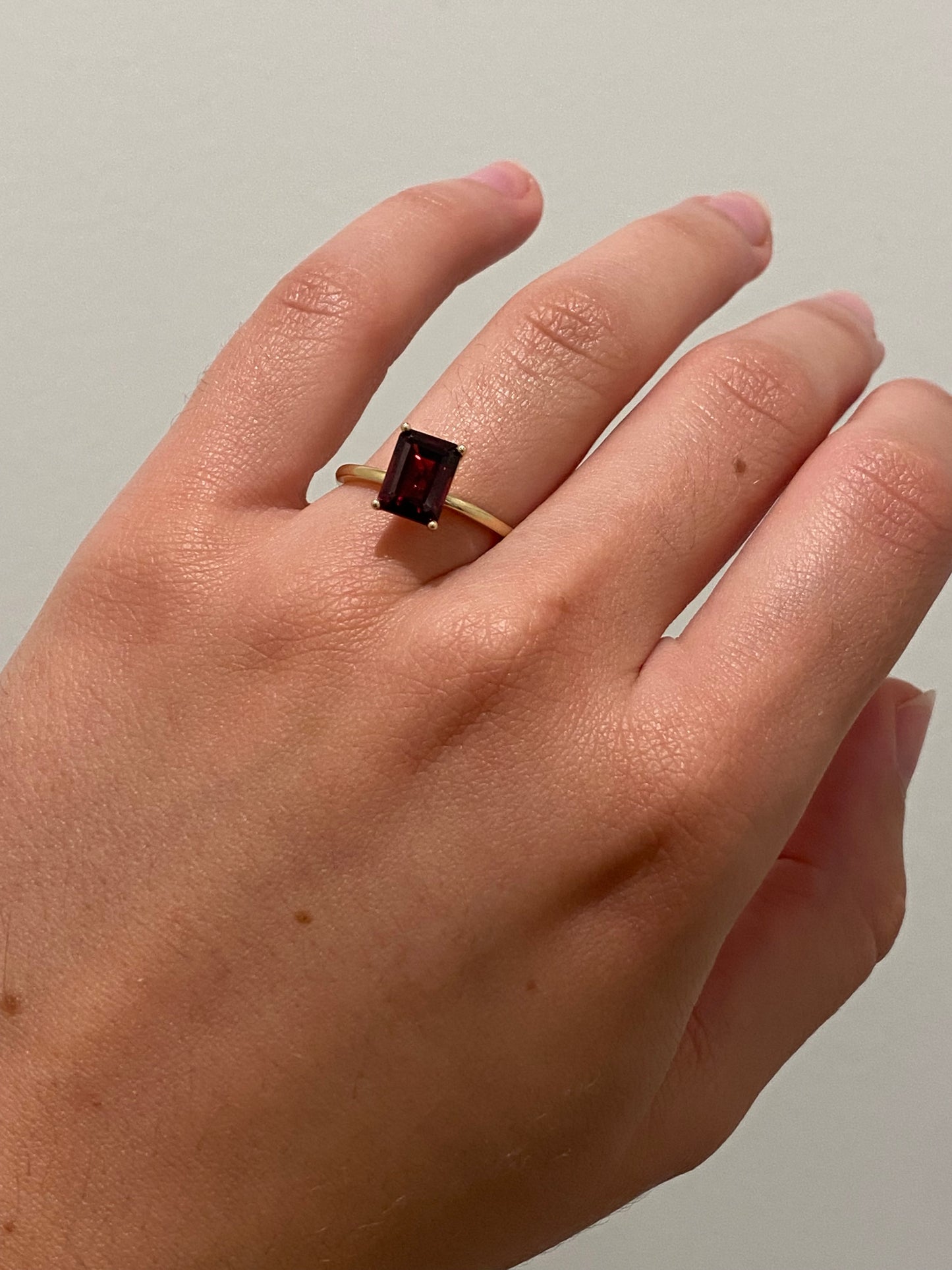 LARGE EMERALD CUT GARNET RING