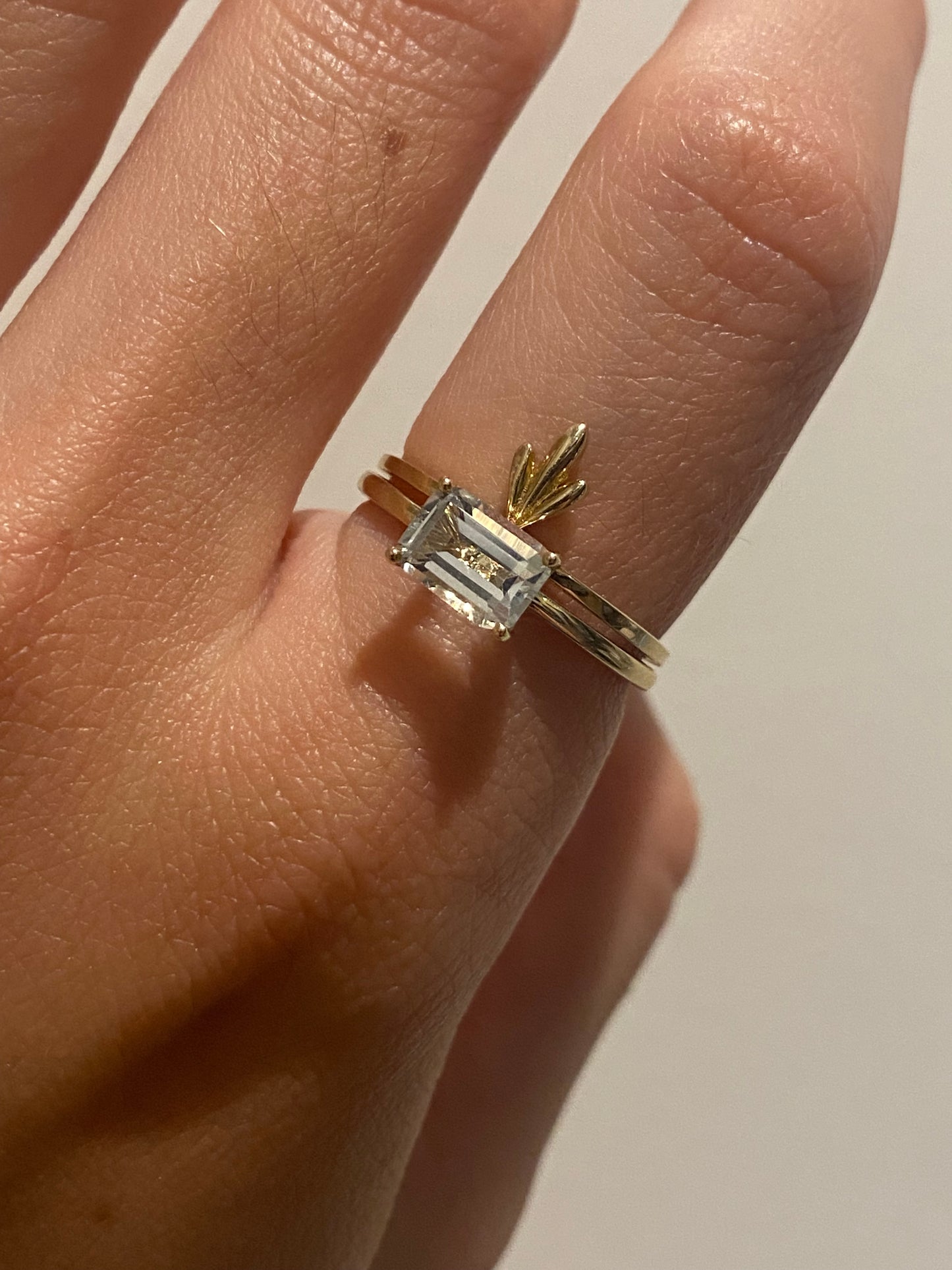 HORIZONTAL EMERALD CUT DIAMOND RING