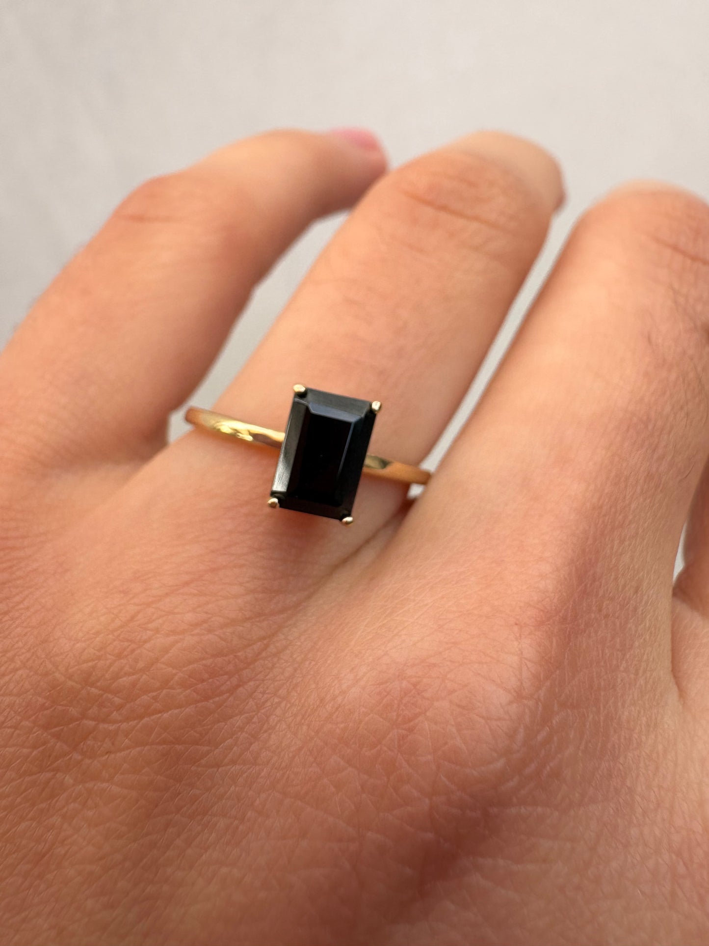 ONYX EMERALD CUT SOLITAIRE RING