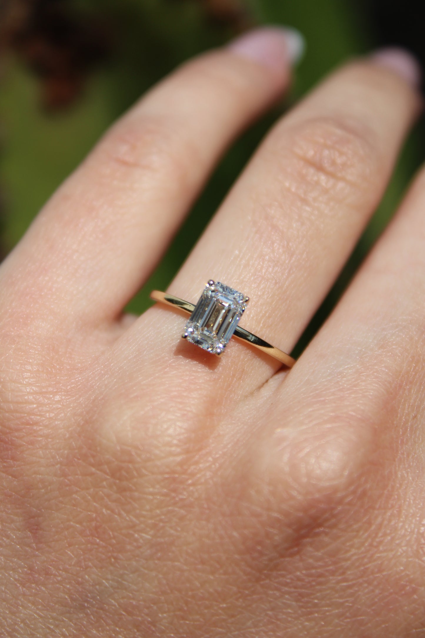 EMERALD CUT DIAMOND SOLITAIRE RING