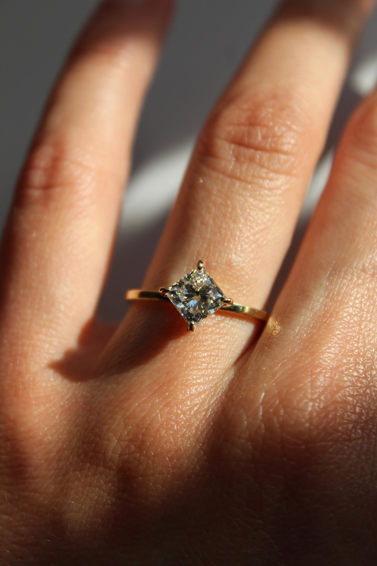 PRINCESS CUT DIAMOND COMPASS RING
