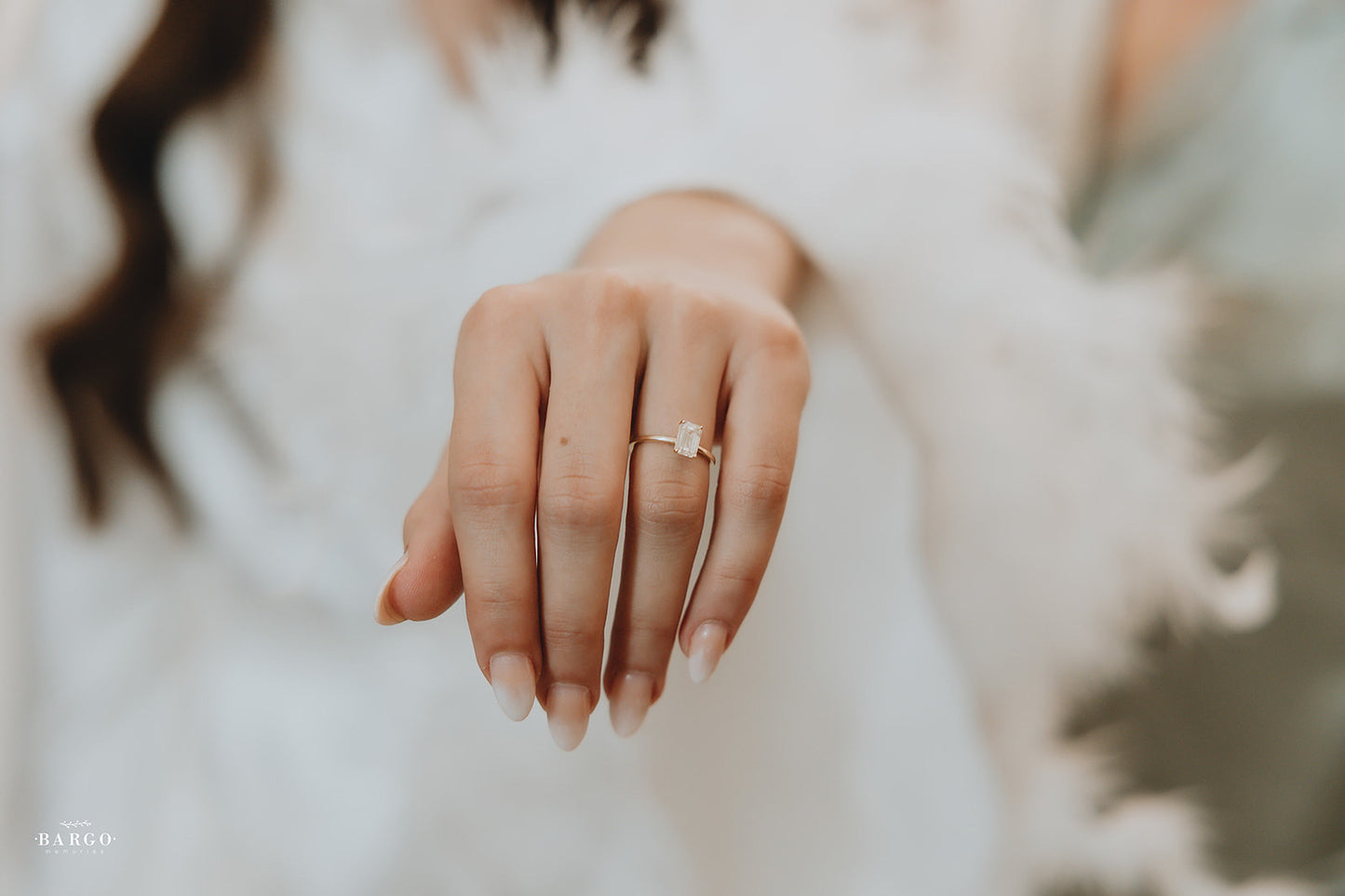 EMERALD CUT WHITE TOPAZ SOLITAIRE RING